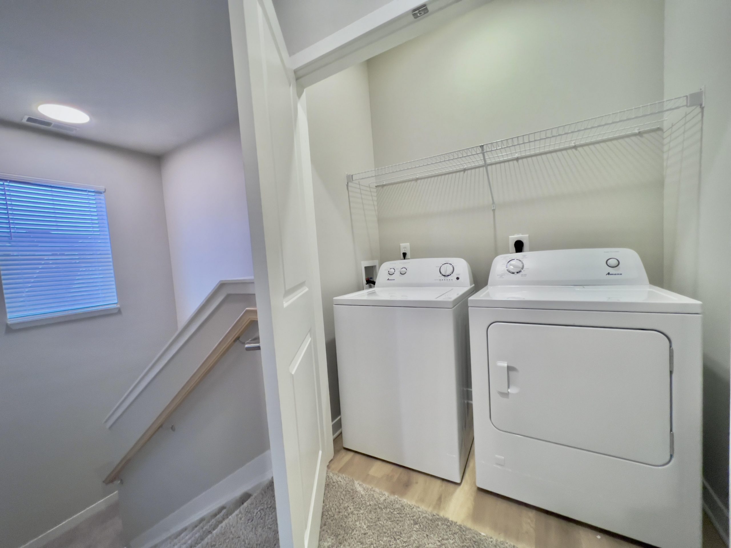 washer and dryer of 2 bedroom townhome Water's Edge Apartments